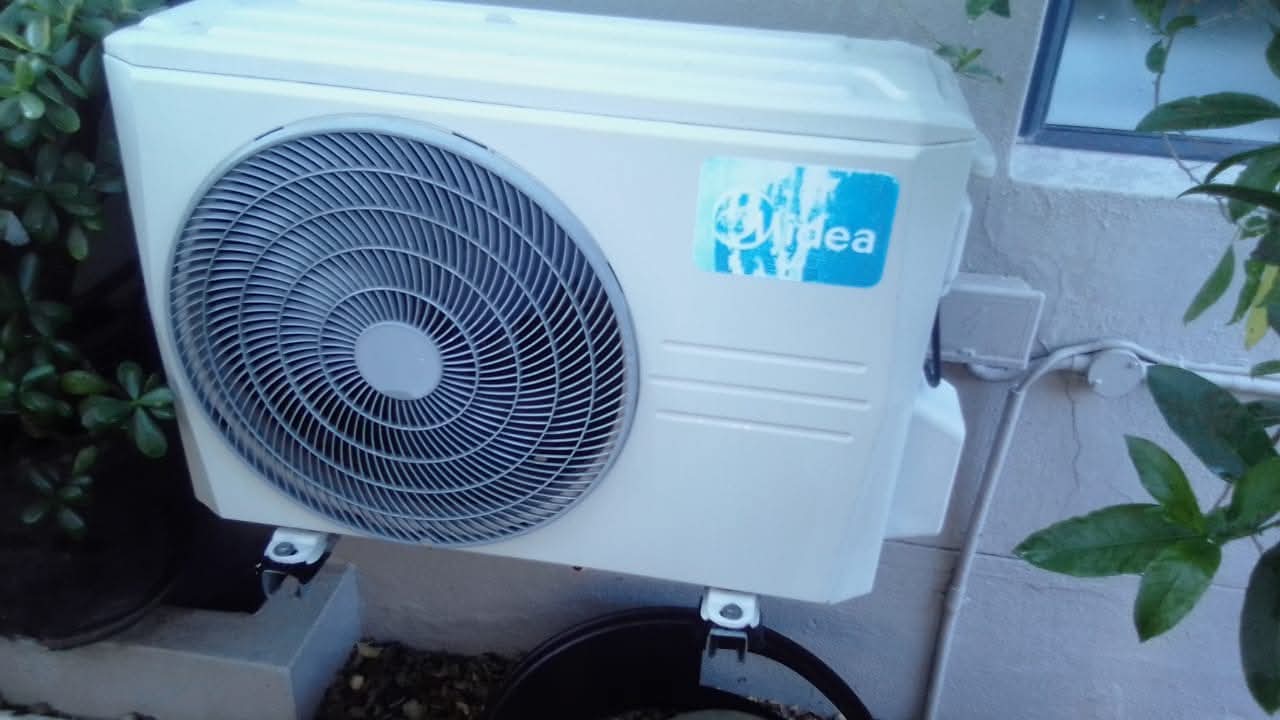 Outdoor unit fitted in a garden corner